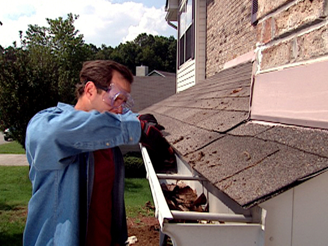 cleaning_out_gutters.jpg