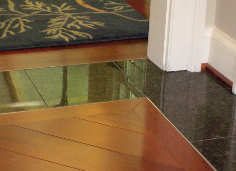 exquisite_flooring_details_brazilian_cherry_wood_floors_granite_flush_transoms.jpg