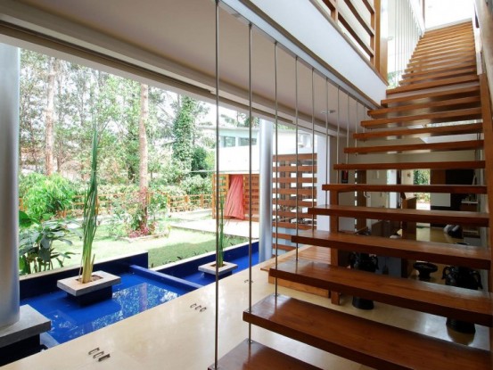 floating_staircase_in_contemporary_anil_kush_residence_in_india_by_architecture_paradigm_553x415.jpg